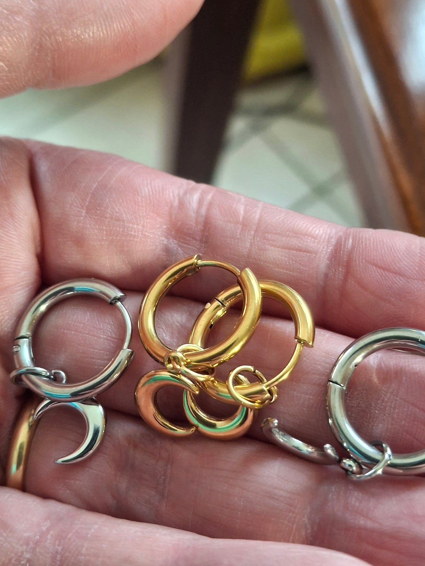 Stainless steel 316 single hoop earrings with moon pendant, sold as a pair