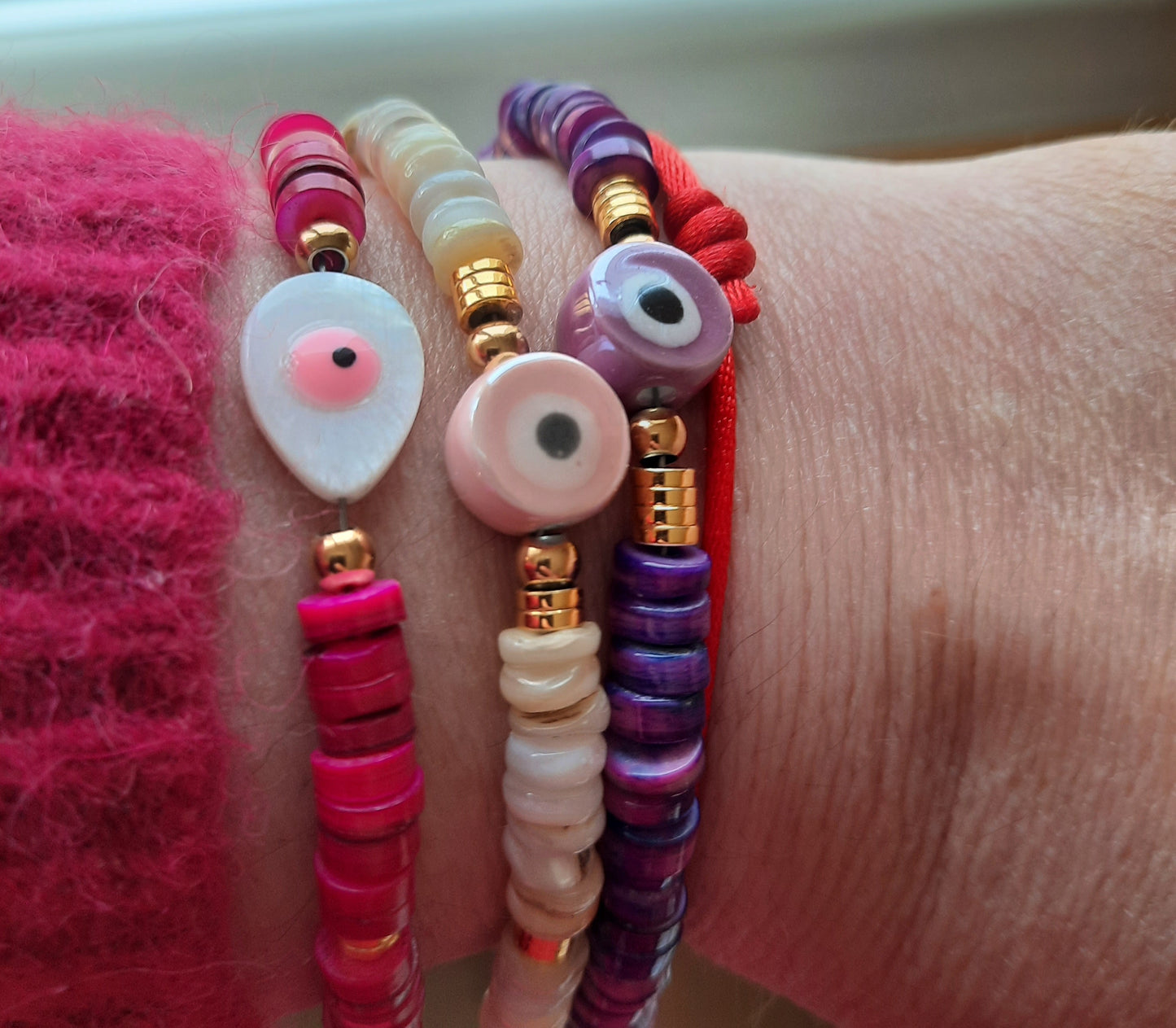 Bracelet perles heishi evil eye