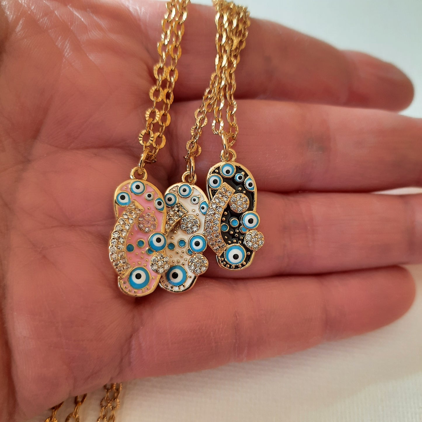 Collier chaîne or stainless steel 316 striée et pendentif tong plaqué or 18K serti zirconium et email evil eye