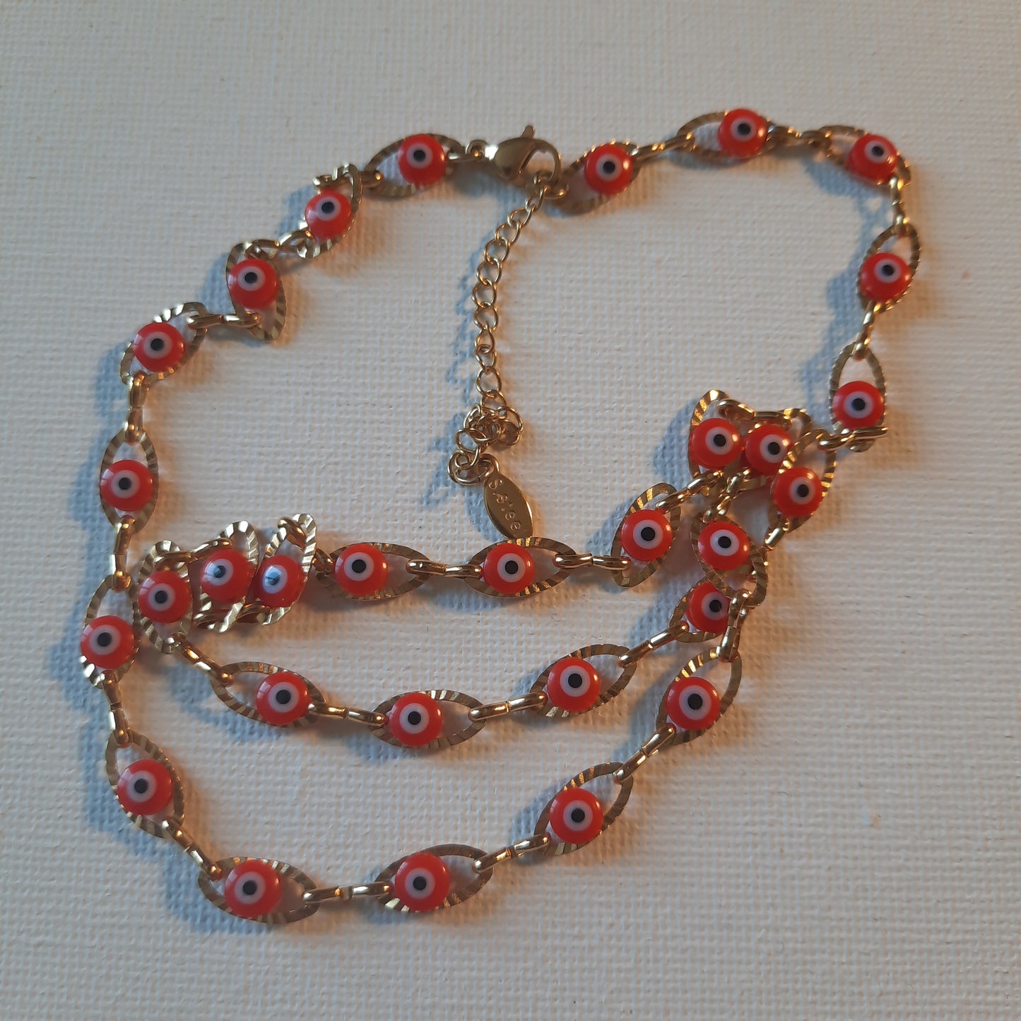 Collier chaîne dorée acier inoxydable stainless steel et perles evil eye, œil de Turquie rouge ajustable réglable