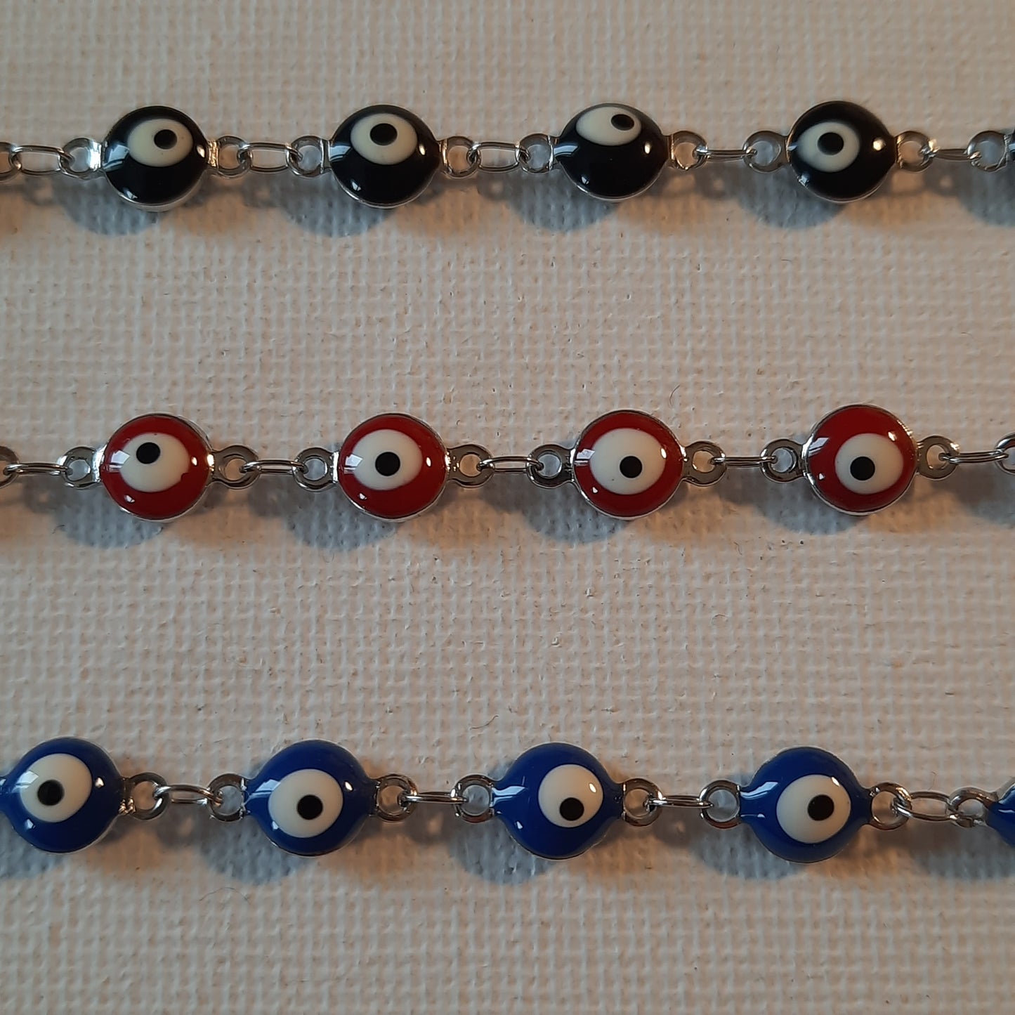 Bracelet de cheville chaîne argentée stainless steel evil eye sur mesure