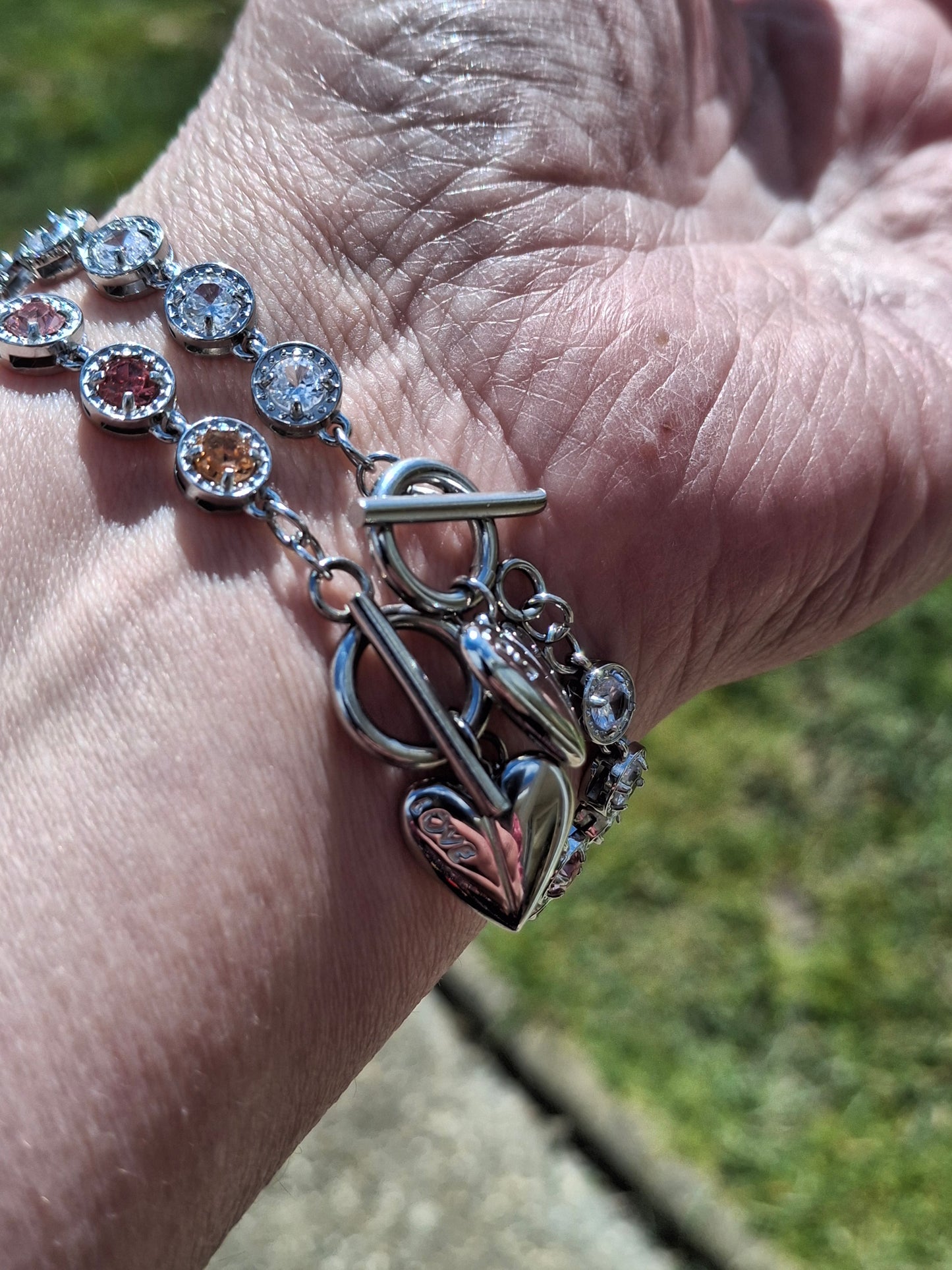 Armband sehr schöne Gliederkette, silberfarben, Edelstahl 316, mit Kristall besetzt, handgefertigt, Knebelverschluss und Herzanhänger Edelstahl 316