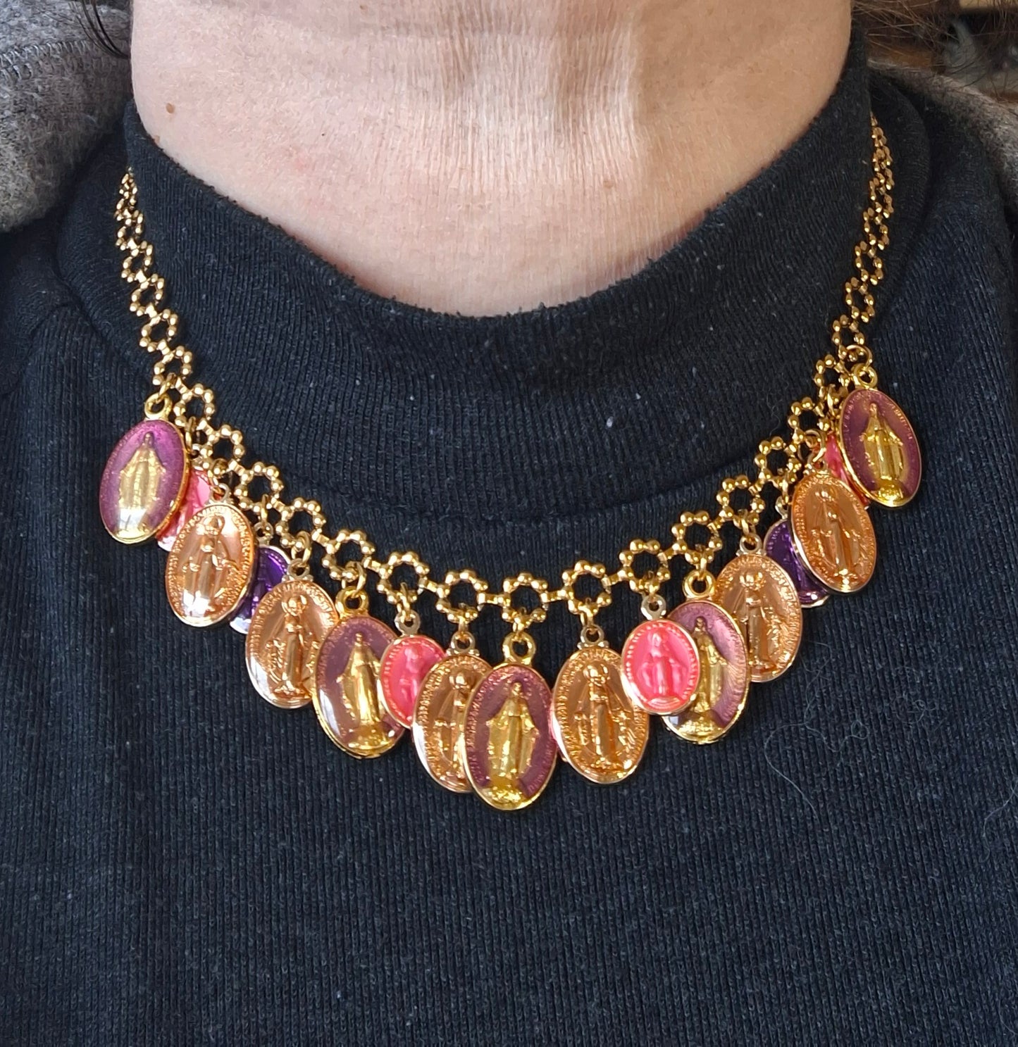 Adjustable gold-tone stainless steel chain necklace with flower motif and Madonna charms