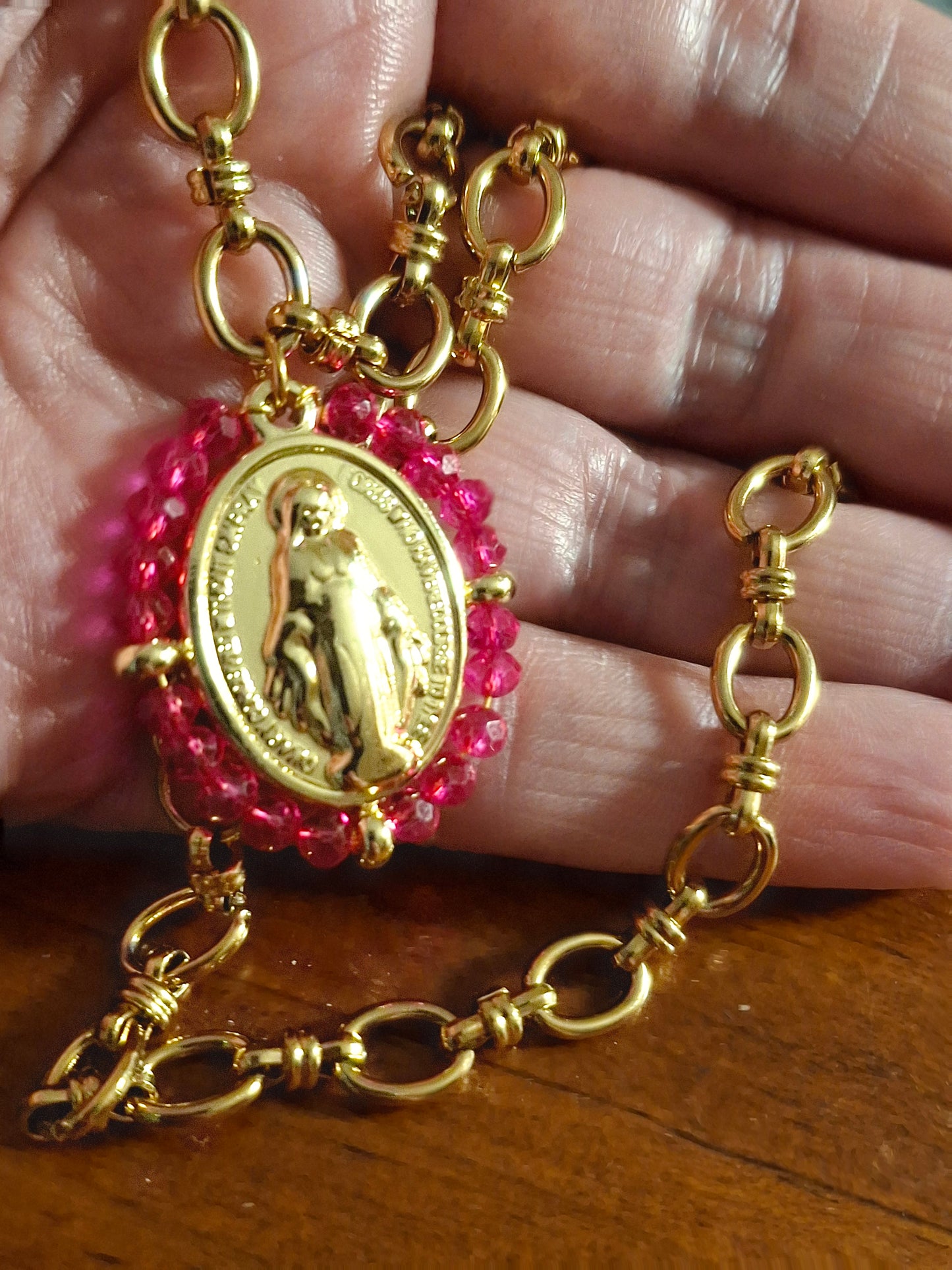 Stainless steel 316 chain necklace with a stainless steel Madonna medallion and faceted crystal beads