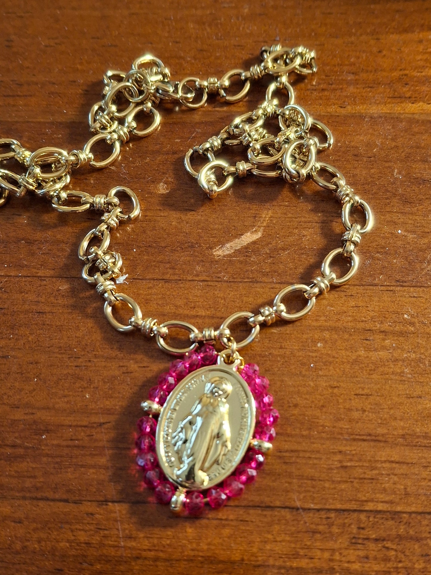 Stainless steel 316 chain necklace with a stainless steel Madonna medallion and faceted crystal beads