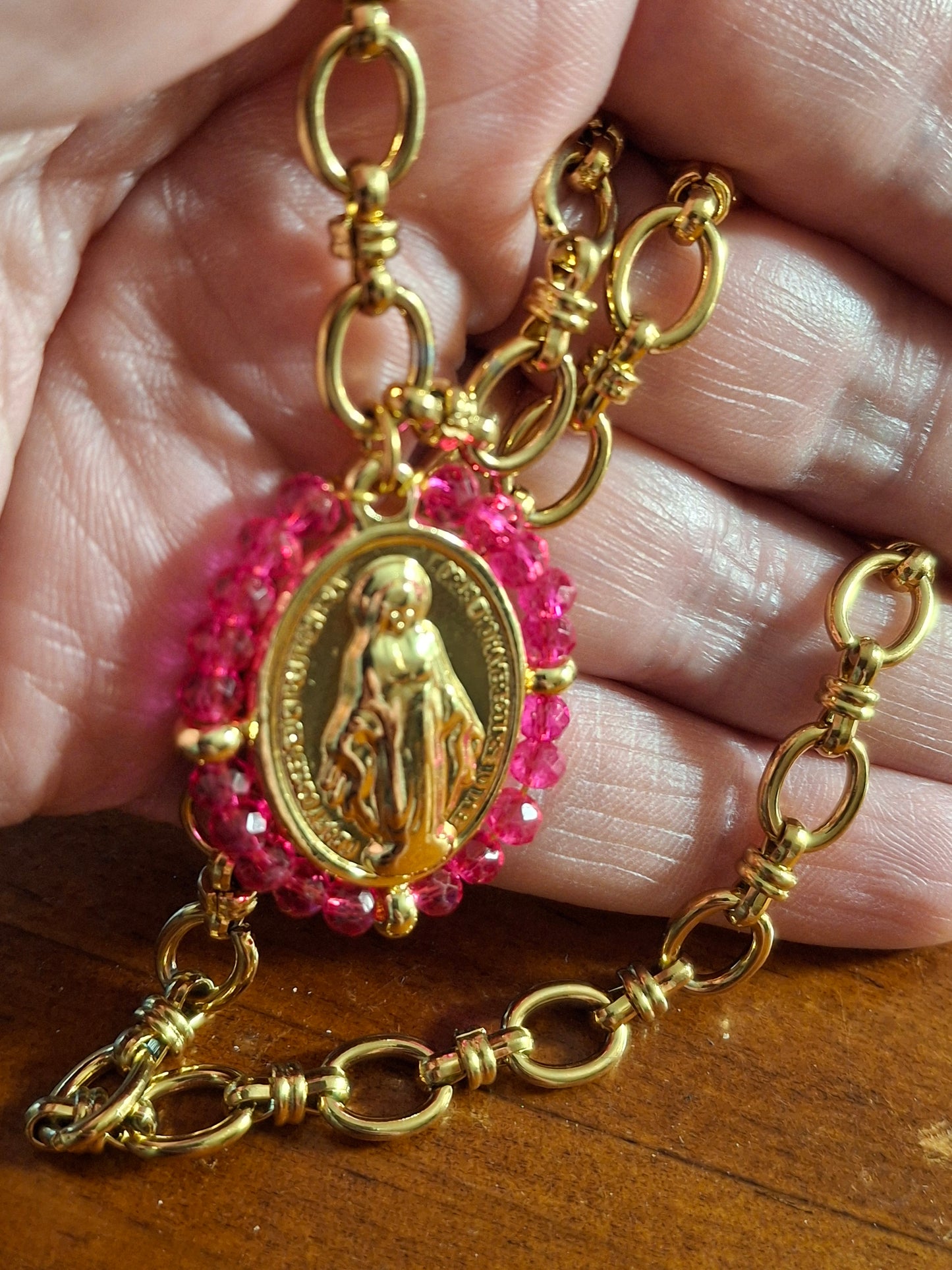 Stainless steel 316 chain necklace with a stainless steel Madonna medallion and faceted crystal beads