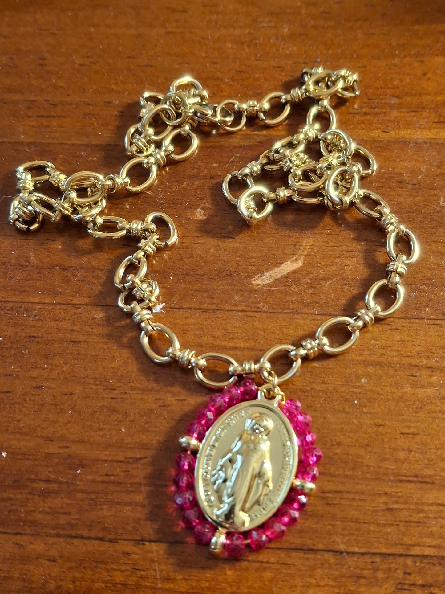 Stainless steel 316 chain necklace with a stainless steel Madonna medallion and faceted crystal beads