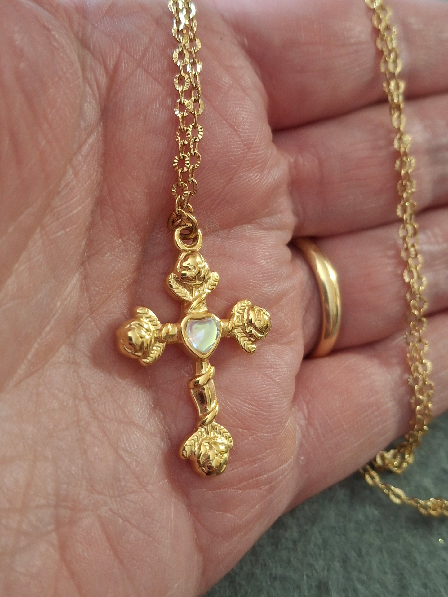 Gold chain necklace made of 316 stainless steel and polished 316 stainless steel cross.