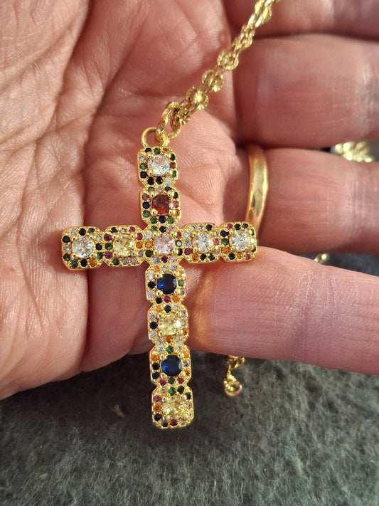Gold-plated stainless steel chain necklace with a large 18K gold-plated cross set with AAA cubic zirconia.