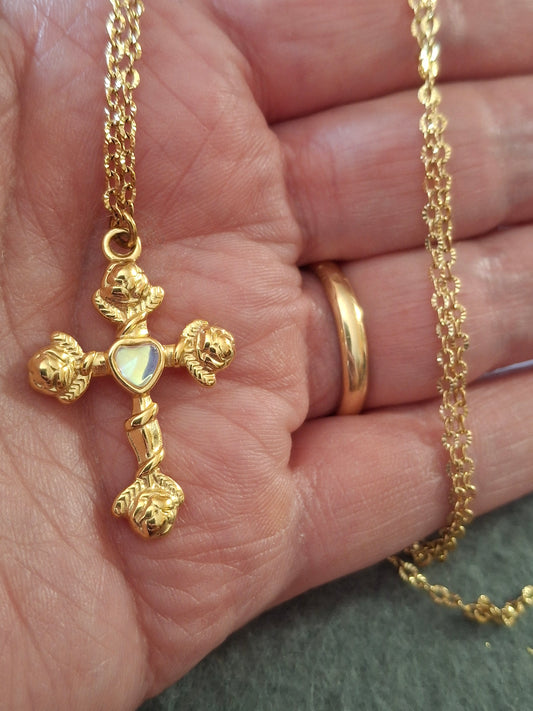 Gold chain necklace made of 316 stainless steel and polished 316 stainless steel cross.