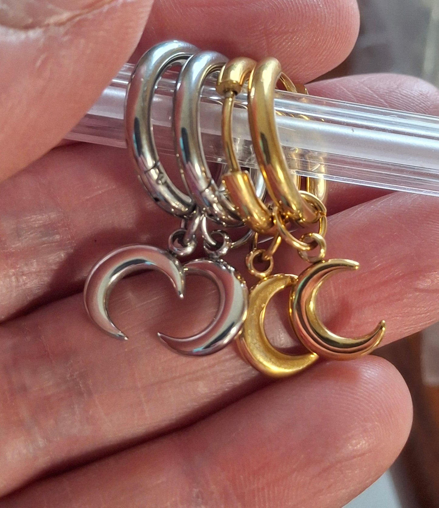 Stainless steel 316 single hoop earrings with moon pendant, sold as a pair