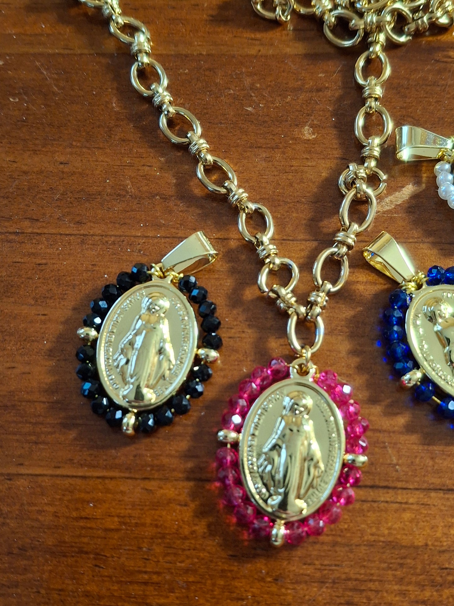 Stainless steel 316 chain necklace with a stainless steel Madonna medallion and faceted crystal beads