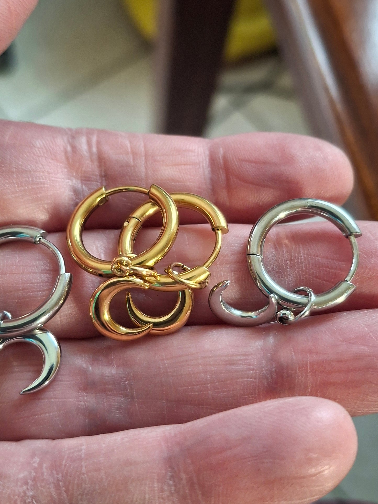 Stainless steel 316 single hoop earrings with moon pendant, sold as a pair