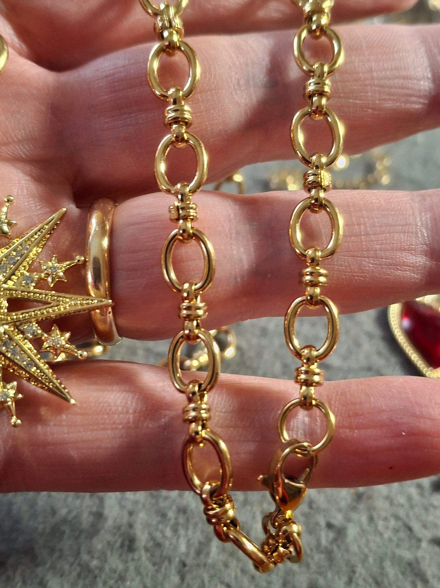 Collier chaîne maille gourmette stainless steel 316 grand pendentif soleil ou étoile plaqué or 18K serti zirconium AAA