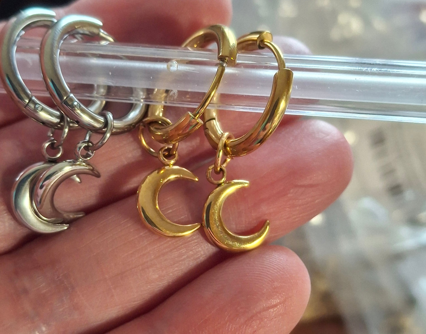 Stainless steel 316 single hoop earrings with moon pendant, sold as a pair