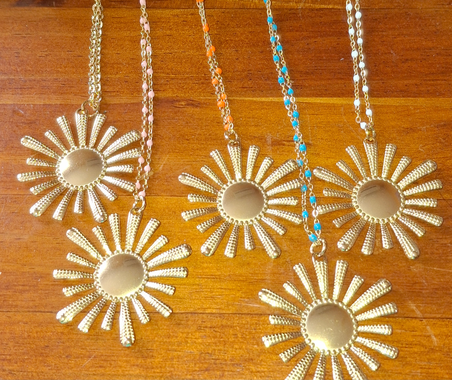 Long necklace with gold stainless steel chain and XXL sun pendant