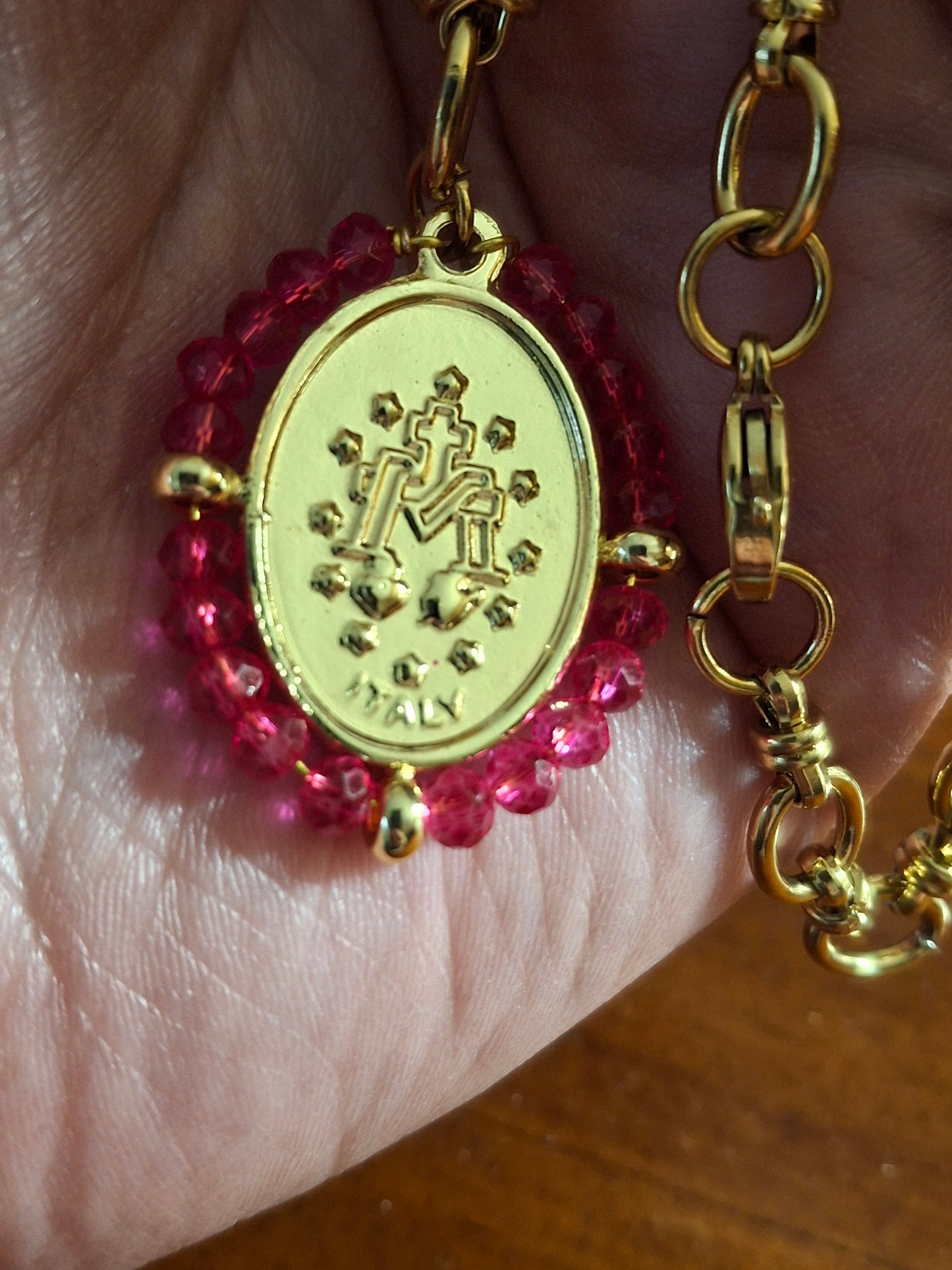 Stainless steel 316 chain necklace with a stainless steel Madonna medallion and faceted crystal beads