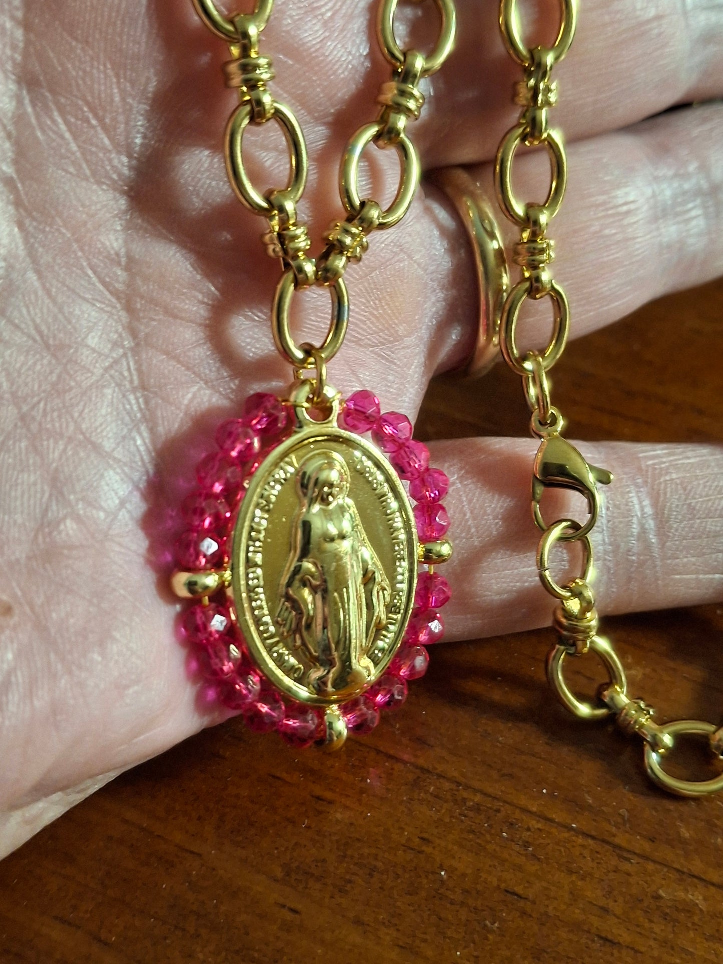 Stainless steel 316 chain necklace with a stainless steel Madonna medallion and faceted crystal beads