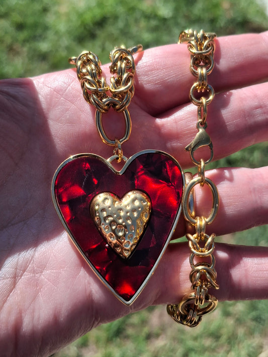 High-quality 316 stainless steel chain necklace with a large 316 stainless steel heart pendant and enamel.