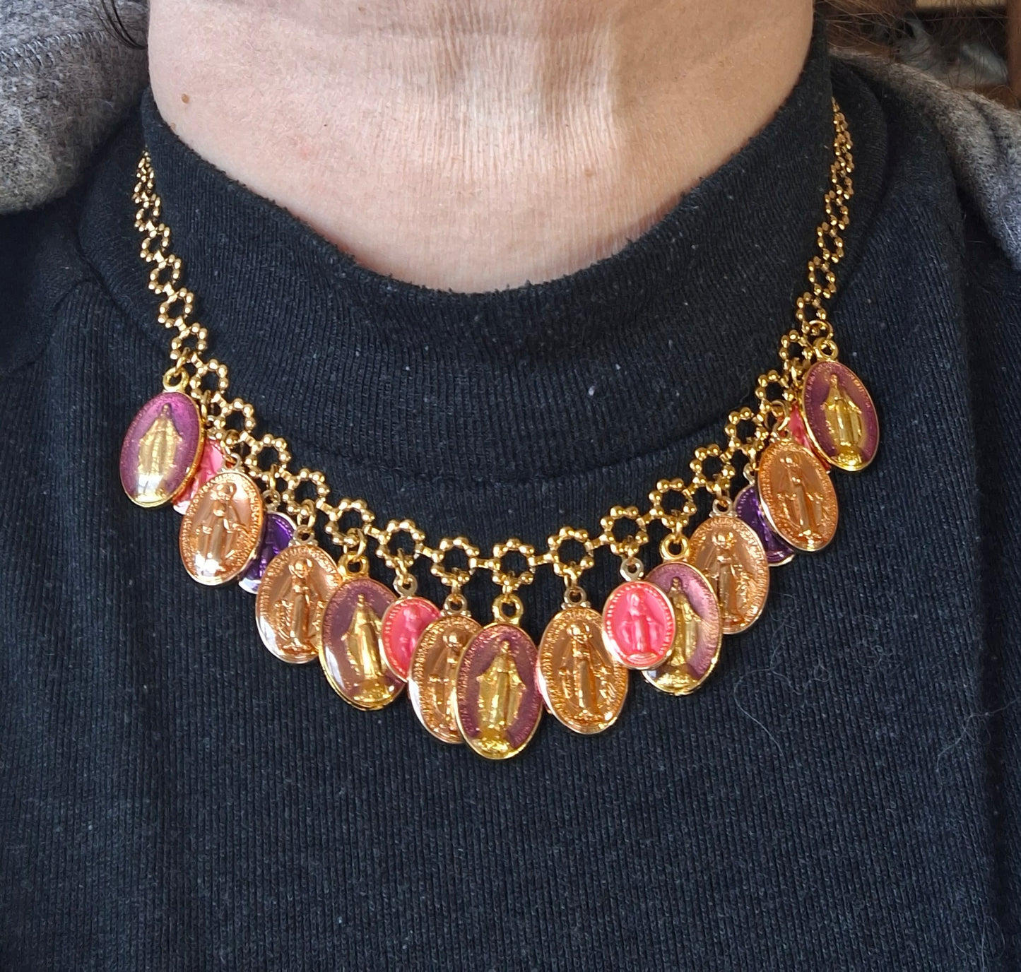 Adjustable gold-tone stainless steel chain necklace with flower motif and Madonna charms