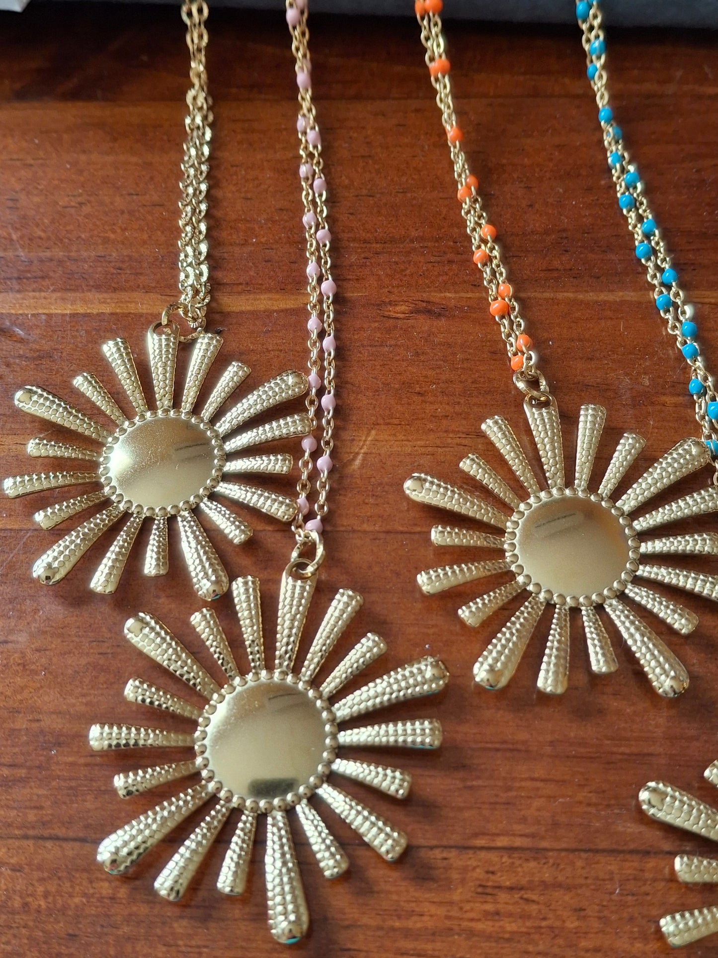 Long necklace with gold stainless steel chain and XXL sun pendant