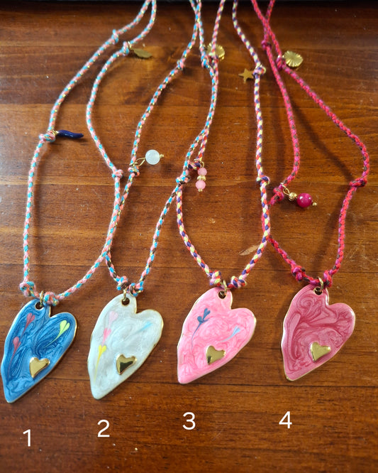 Adjustable braided cord necklace, handmade, with a 316 stainless steel and enamel heart pendant.