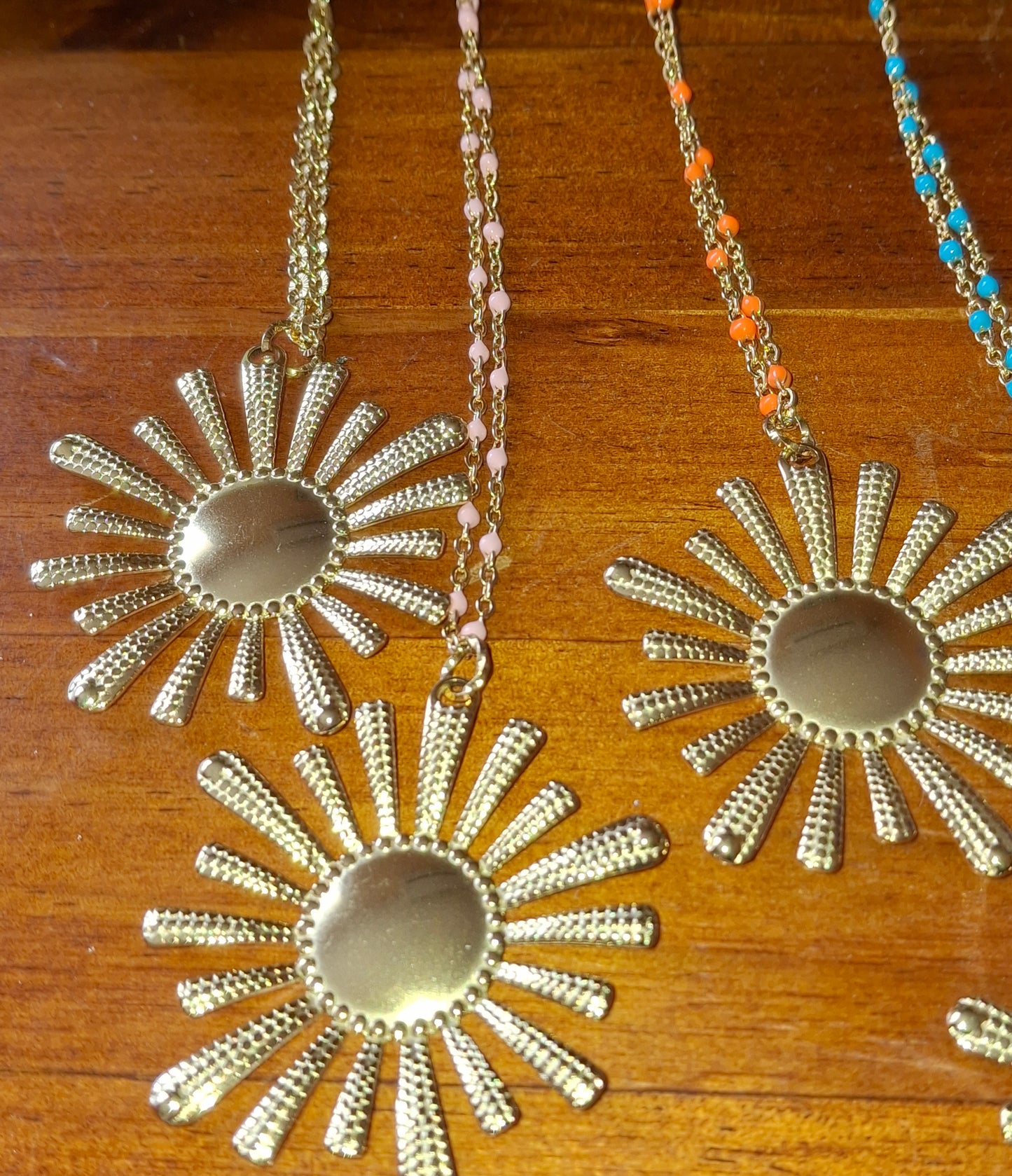 Long necklace with gold stainless steel chain and XXL sun pendant